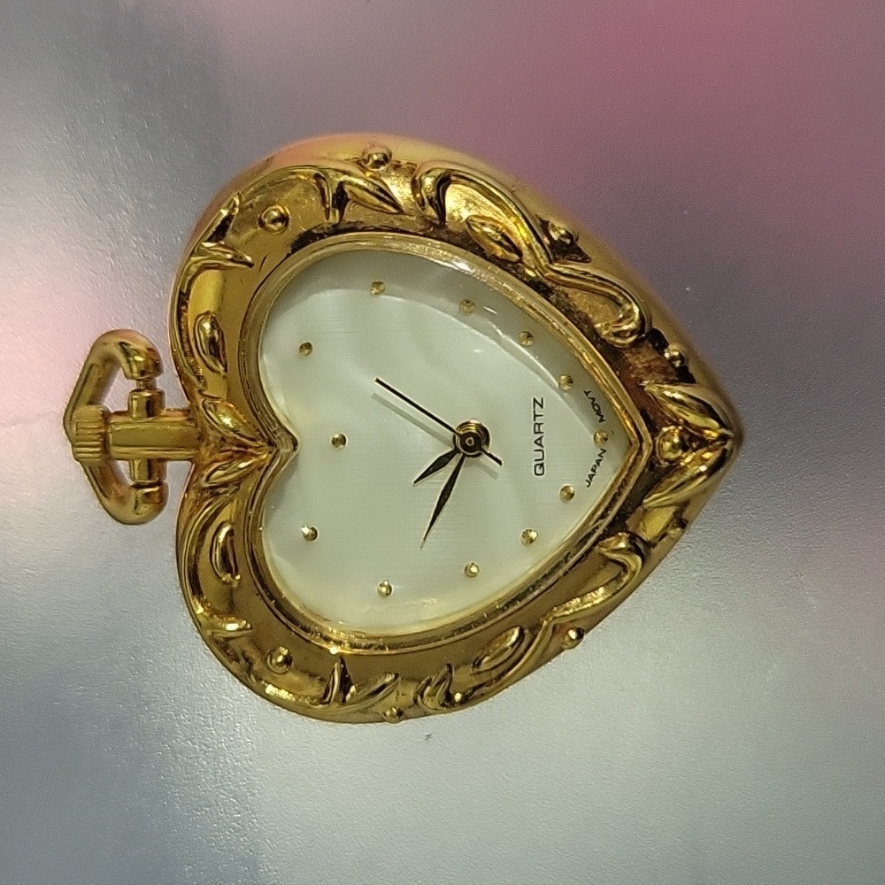 Heart-shaped gold color watch